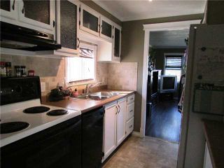 Photo 5: 8819 75TH Street in Fort St. John: Fort St. John - City SE Manufactured Home for sale in "ANNEOFIELD" (Fort St. John (Zone 60))  : MLS®# N230729