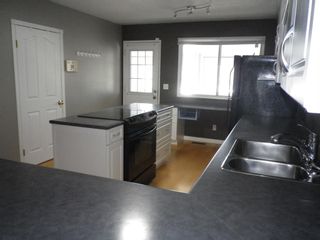 Photo 8: 2 Westhill Place: Didsbury Semi Detached (Half Duplex) for sale : MLS®# A2025445