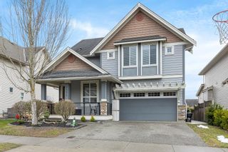 Photo 1: 2092 ZINFANDEL Drive in Abbotsford: Aberdeen House for sale in "Pepin Brook" : MLS®# R2758629