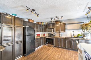Photo 4: 180 Marquis Place SE: Airdrie Detached for sale : MLS®# A1207440