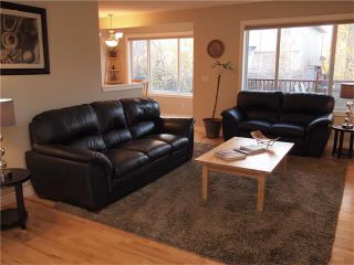 Photo 4: 323 COUGAR RIDGE Drive SW in Calgary: Cougar Ridge House for sale : MLS®# C4046260