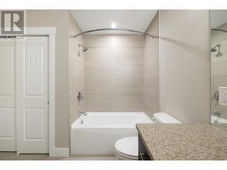 Photo 14: 1165 Sutherland Avenue Unit# 403 in Kelowna: House for sale : MLS®# 10313029