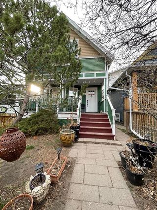 Photo 1: 920 2 Avenue NW in Calgary: Sunnyside Detached for sale : MLS®# A2126095