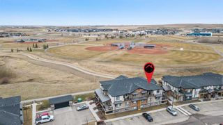 Main Photo: 8303 2781 Chinook Winds Drive SW: Airdrie Row/Townhouse for sale : MLS®# A2121835