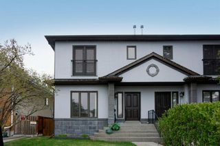 Main Photo: 215 26 Avenue NE in Calgary: Tuxedo Park Semi Detached for sale : MLS®# A1220251