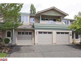 Photo 1: 320 13888 70TH Avenue in Surrey: East Newton Townhouse for sale in "CHELSEA GARDENS" : MLS®# F1217044