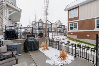 Photo 4: 623 Cranbrook Walk SE in Calgary: Cranston Row/Townhouse for sale : MLS®# A2119555
