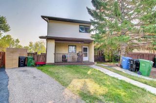 Photo 1: 22 Ranchlands Place NW in Calgary: Ranchlands Row/Townhouse for sale : MLS®# A2000789