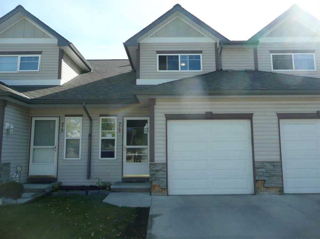 Main Photo: 215 Millview Green SW in Calgary: Millrise Row/Townhouse for sale : MLS®# A2080597