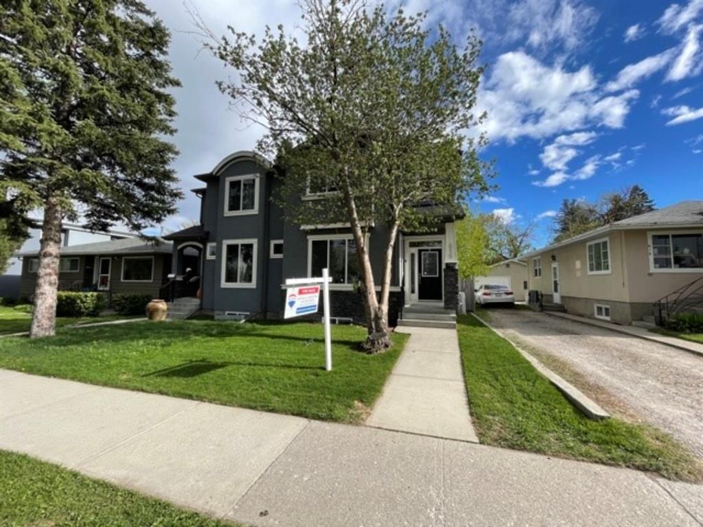 Main Photo: 615 50 Avenue SW in Calgary: Windsor Park Semi Detached for sale : MLS®# A1099934