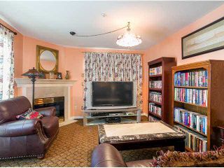 Photo 2: 302 1655 GRANT Avenue in Port Coquitlam: Glenwood PQ Condo for sale in "BENTON" : MLS®# V1081330