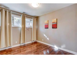Photo 18: 5612 LADBROOKE Drive SW in Calgary: Lakeview House for sale : MLS®# C4036600