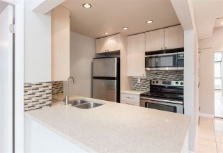 Photo 1: 102 838 AGNES STREET in : Downtown NW Condo for sale : MLS®# R2180674