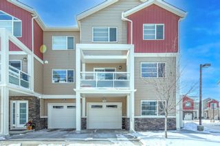 Photo 1: 704 Redstone View NE in Calgary: Redstone Row/Townhouse for sale : MLS®# A1198611