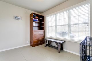 Photo 4: 304 Ascot Circle SW in Calgary: Aspen Woods Row/Townhouse for sale : MLS®# A1217542