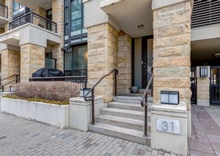 Photo 2: 31 Waterfront Mews SW in Calgary: Chinatown Row/Townhouse for sale : MLS®# A2113794