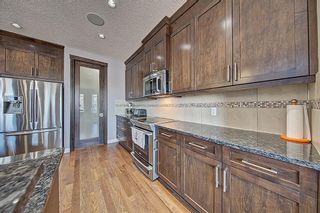 Photo 6: 437 Kinniburgh Boulevard: Chestermere Detached for sale : MLS®# A2021132
