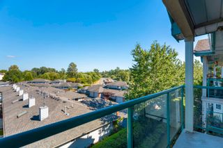 Photo 32: 403 20443 53 Avenue in Langley: Langley City Condo for sale in "COUNTRYSIDE ESTATES" : MLS®# R2717128