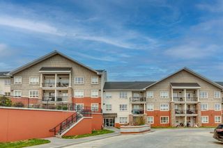 Main Photo: 218 26 Val Gardena View SW in Calgary: Springbank Hill Apartment for sale : MLS®# A2050087