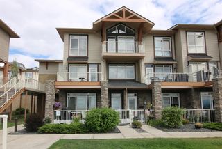 Main Photo: 1 181 Rockyledge View NW in Calgary: Rocky Ridge Row/Townhouse for sale : MLS®# A1168675