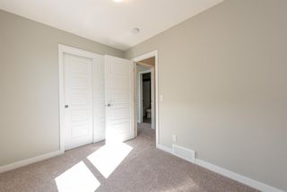 Photo 12: 121 301 REDSTONE Boulevard in Calgary: Redstone Row/Townhouse for sale : MLS®# A1246267