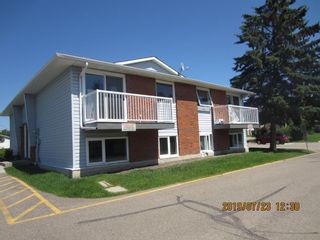 Photo 1: 6336 58 Avenue: Red Deer Row/Townhouse for sale : MLS®# A1177863