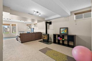 Photo 32: 1555 Meadowbrook Drive SE: Airdrie Detached for sale : MLS®# A2121076