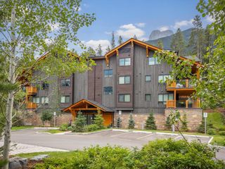 Photo 1: 201 3000E Stewart Creek Drive: Canmore Apartment for sale : MLS®# A1245269