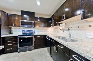 Photo 7: 77 SPRUCE PL SW in Calgary: Spruce Cliff Condo for sale
