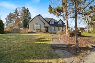 Photo 1: 14318 HAWKSTREAM Drive in Surrey: Bear Creek Green Timbers House for sale : MLS®# R2774885