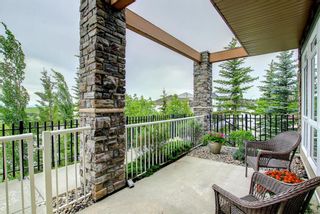 Photo 32: 1 108 Rockyledge View NW in Calgary: Rocky Ridge Row/Townhouse for sale : MLS®# A1234759