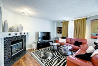 Photo 2: 311 Cougarstone Circle SW in Calgary: Cougar Ridge Detached for sale : MLS®# A2048035