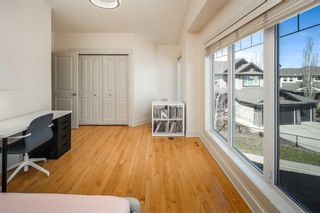 Photo 32: 222 Tremblant Place SW in Calgary: Springbank Hill Detached for sale : MLS®# A2125693