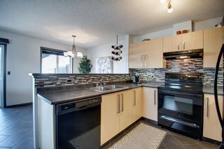 Photo 8: 101 760 Railway Gate SW: Airdrie Row/Townhouse for sale : MLS®# A2045481