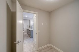 Photo 8: 306 100 Auburn Meadows Manor SE in Calgary: Auburn Bay Apartment for sale : MLS®# A1245562