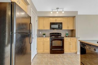Photo 9: 561 Panamount Boulevard NW in Calgary: Panorama Hills Semi Detached for sale : MLS®# A1154675