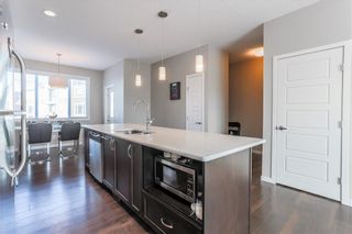 Photo 12: 153 PANATELLA Square NW in Calgary: Panorama Hills Row/Townhouse for sale : MLS®# C4305575