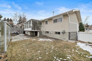 Photo 6: 7740 Hunterquay Road NW in Calgary: Huntington Hills Detached for sale : MLS®# A2021746