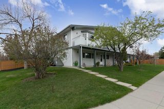 Photo 2: 3340 41 Street SW in Calgary: Glenbrook Full Duplex for sale : MLS®# A2099392