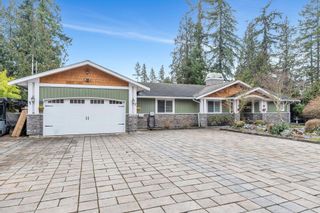 Photo 1: 19858 38 Avenue in Langley: Brookswood Langley House for sale : MLS®# R2759479