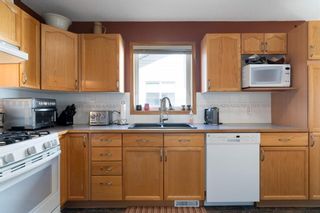 Photo 3: 312 Woodside Circle NW: Airdrie Detached for sale : MLS®# A1240551