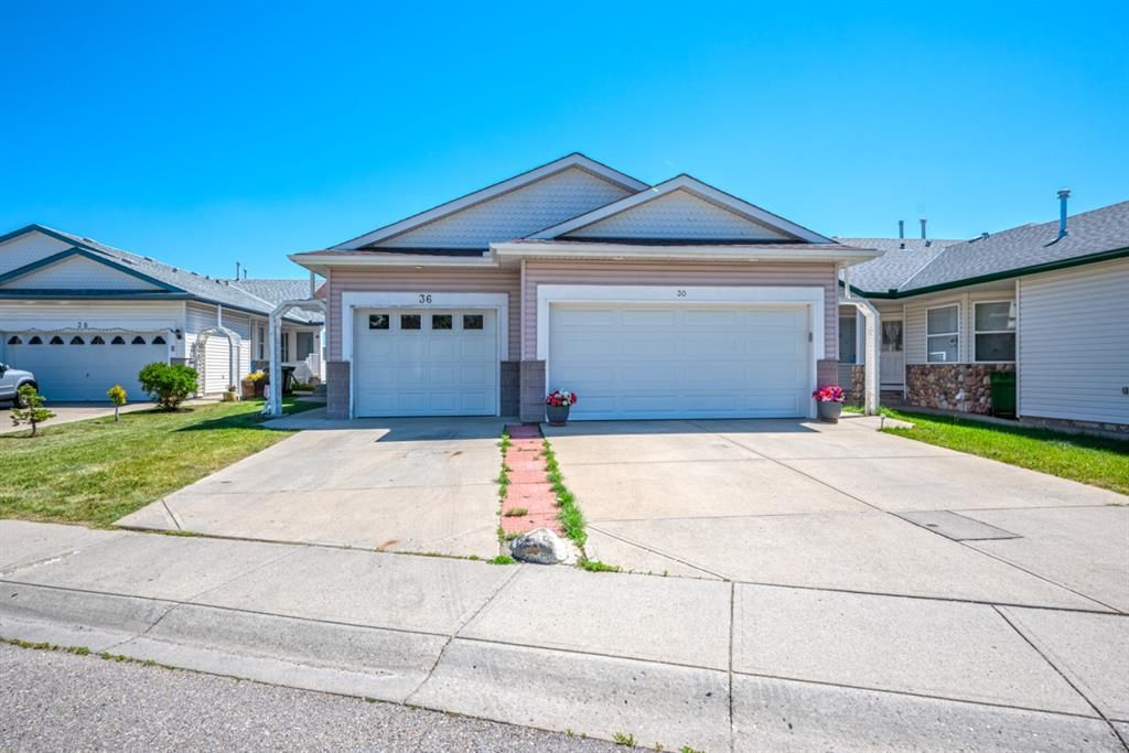 Main Photo: 36 Arbour Grove Close NW in Calgary: Arbour Lake Semi Detached for sale : MLS®# A1241960