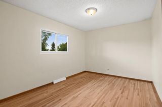 Photo 12: 319 Spyhill Road NW in Calgary: Thorncliffe Detached for sale : MLS®# A1233288
