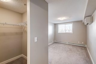 Photo 23: 201 162 Country Village Circle in Calgary: Country Hills Village Apartment for sale : MLS®# A1168604