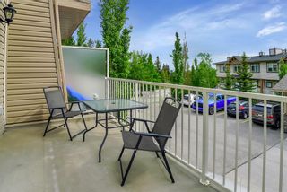 Photo 2: 4 172 Rockyledge View NW in Calgary: Rocky Ridge Row/Townhouse for sale : MLS®# A1246080