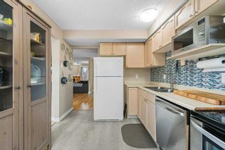 Photo 3: 10 Coachway Gardens SW in Calgary: Coach Hill Row/Townhouse for sale : MLS®# A2126800