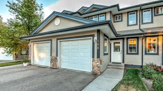 Photo 1: 108 Stonemere Place: Chestermere Row/Townhouse for sale : MLS®# A1259349