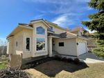 Main Photo: 915 Sierra Morena Place SW in Calgary: Signal Hill Detached for sale : MLS®# A2123630