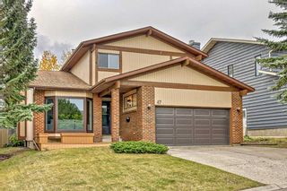 Main Photo: 47 Coachwood Place SW in Calgary: Coach Hill Detached for sale : MLS®# A2078145