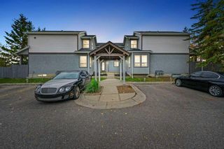 Main Photo: 702 Signal Hill Green SW in Calgary: Signal Hill Row/Townhouse for sale : MLS®# A2083539